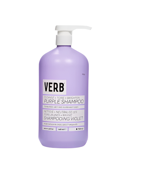 A 32 fl.oz bottle of Brightening Purple Shampoo for Blonde Hair, featuring a convenient pump, comes in a lavender-colored design and is formulated to cleanse, neutralize brassy tones, and brighten blonde, grey, and silver hair.