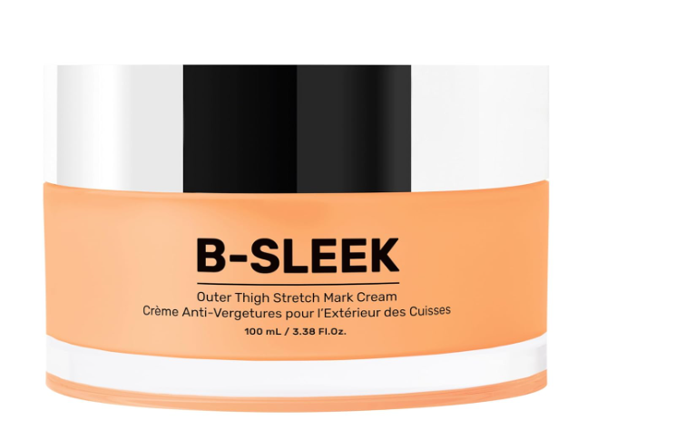 A 100 ml jar of B-Sleek B-SLEEK Outer Thigh Stretch Mark Cream, showcasing an orange label with black text and a silver lid, includes a bilingual description emphasizing its goal of improving skin elasticity specifically for the outer thighs.