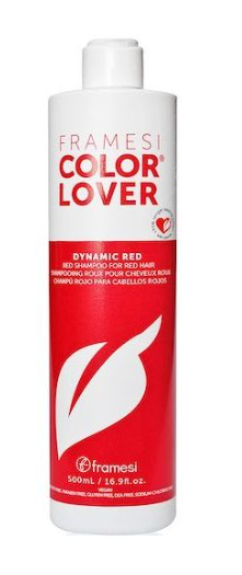 A 16.9 oz bottle of Framesi Color Lover Dynamic Red Shampoo, specially formulated for color-treated hair. This white bottle features a distinctive red label adorned with a white leaf design, ideal for preserving vibrant red hues.