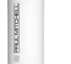 A white bottle of Paul Mitchell Invisiblewear Boomerang Restyling Mist, Detangles + Revives, designed for fine hair and containing 8.5 fl. oz. The bottle is equipped with a spray nozzle on top and includes descriptions in multiple languages.