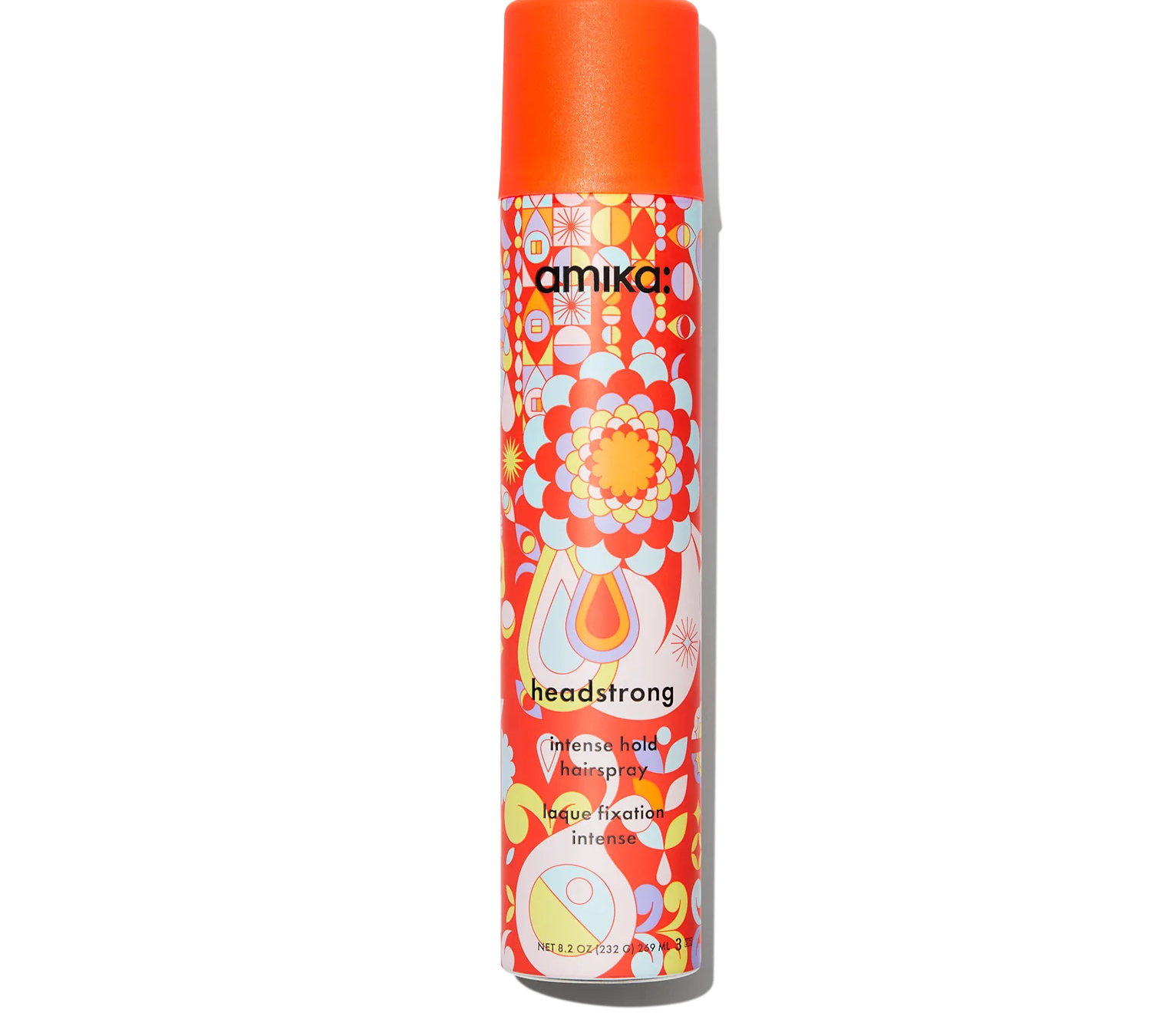 A vibrant spray can features a retro design with floral and abstract patterns, topped with an eye-catching orange cap. The label reads "Amika headstrong intense hold hairspray 8.2 Fl.oz," promising a humidity-resistant formula for flawless styling in any weather.