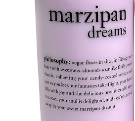 A large, pink bottle of Philosophy 64oz Marzipan Dreams Shampoo Shower Gel Bubble Bath, known for its poetic description of the sweet marzipan scent. This versatile product can be used as a shampoo, shower gel, and bubble bath and has a capacity of 1920 ml or 64 fl. oz.