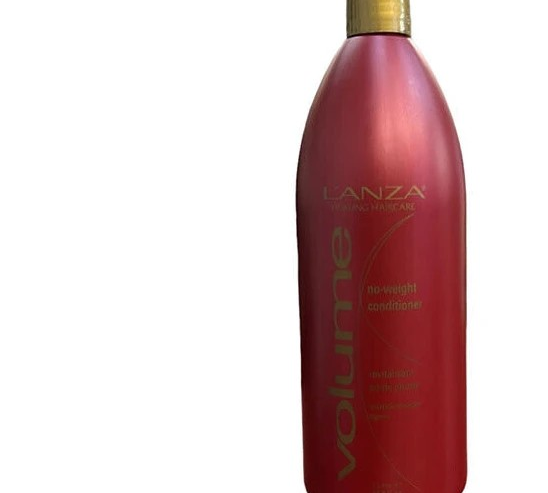 A bottle of Lanza Healing Haircare Volume No-Weight Conditioner 33.8oz in red and gold is positioned against a white background.